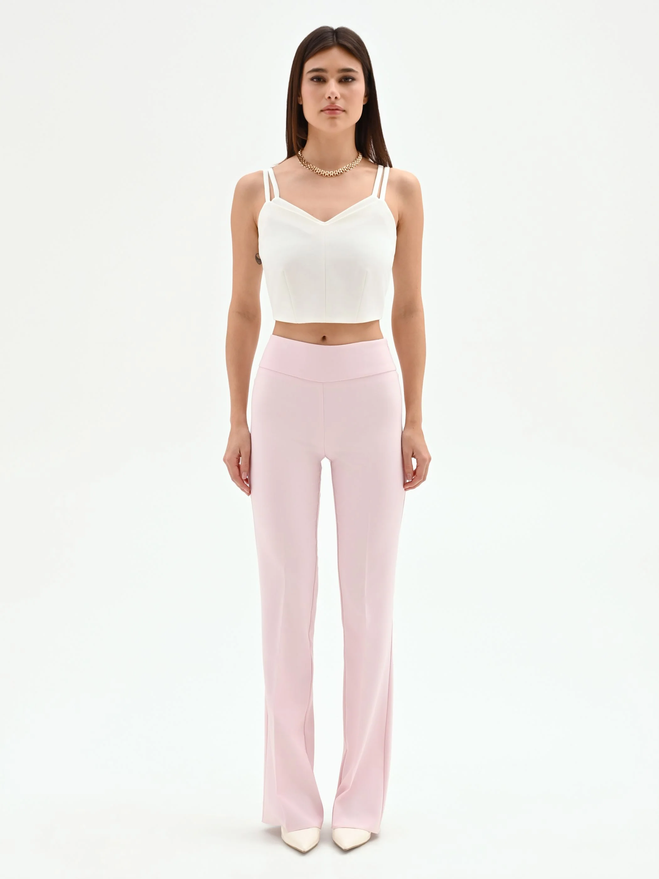 Pantalone mid flared rosa pastello a vita alta