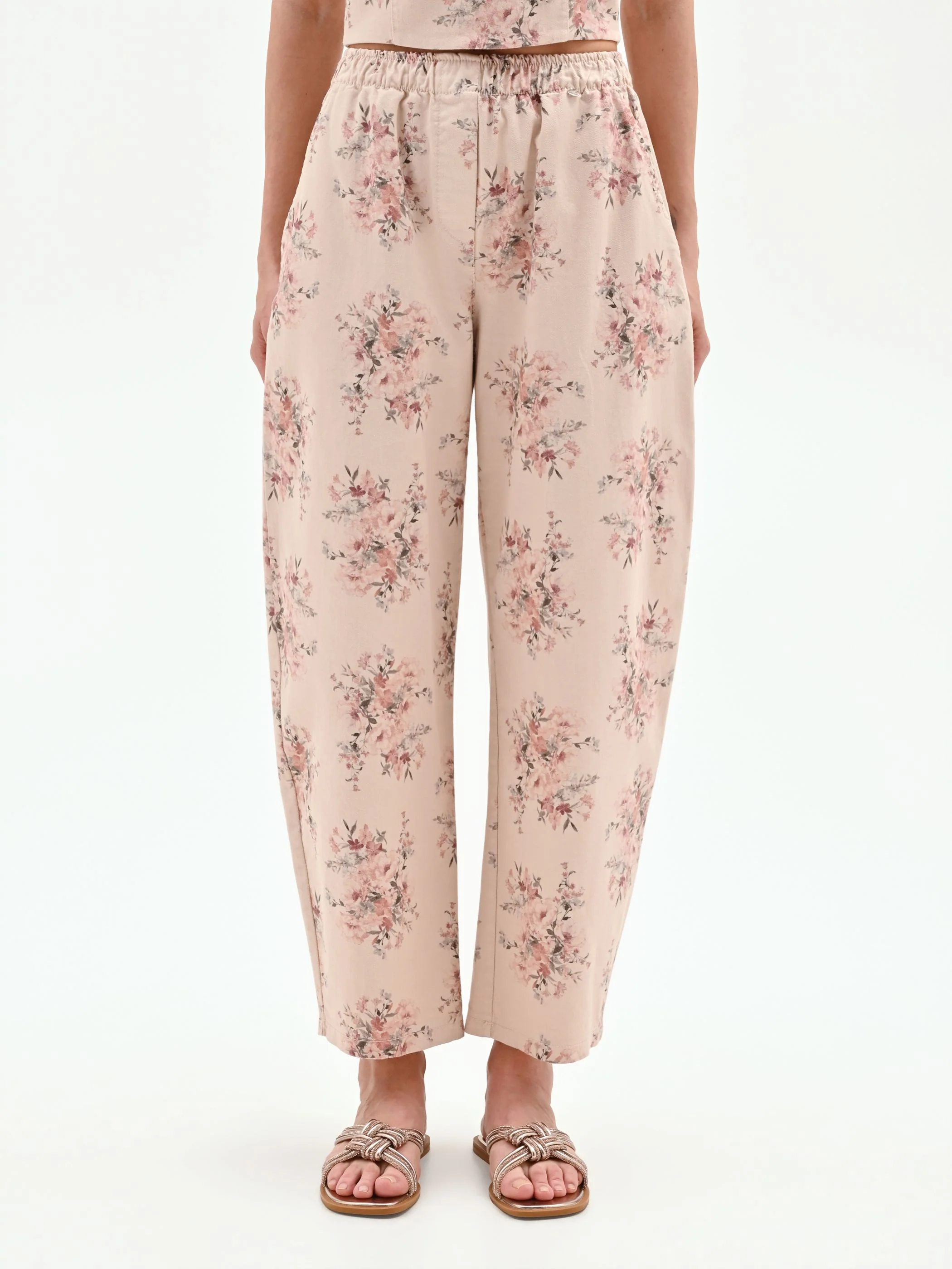 Pantalone rosa in denim stampa floreale