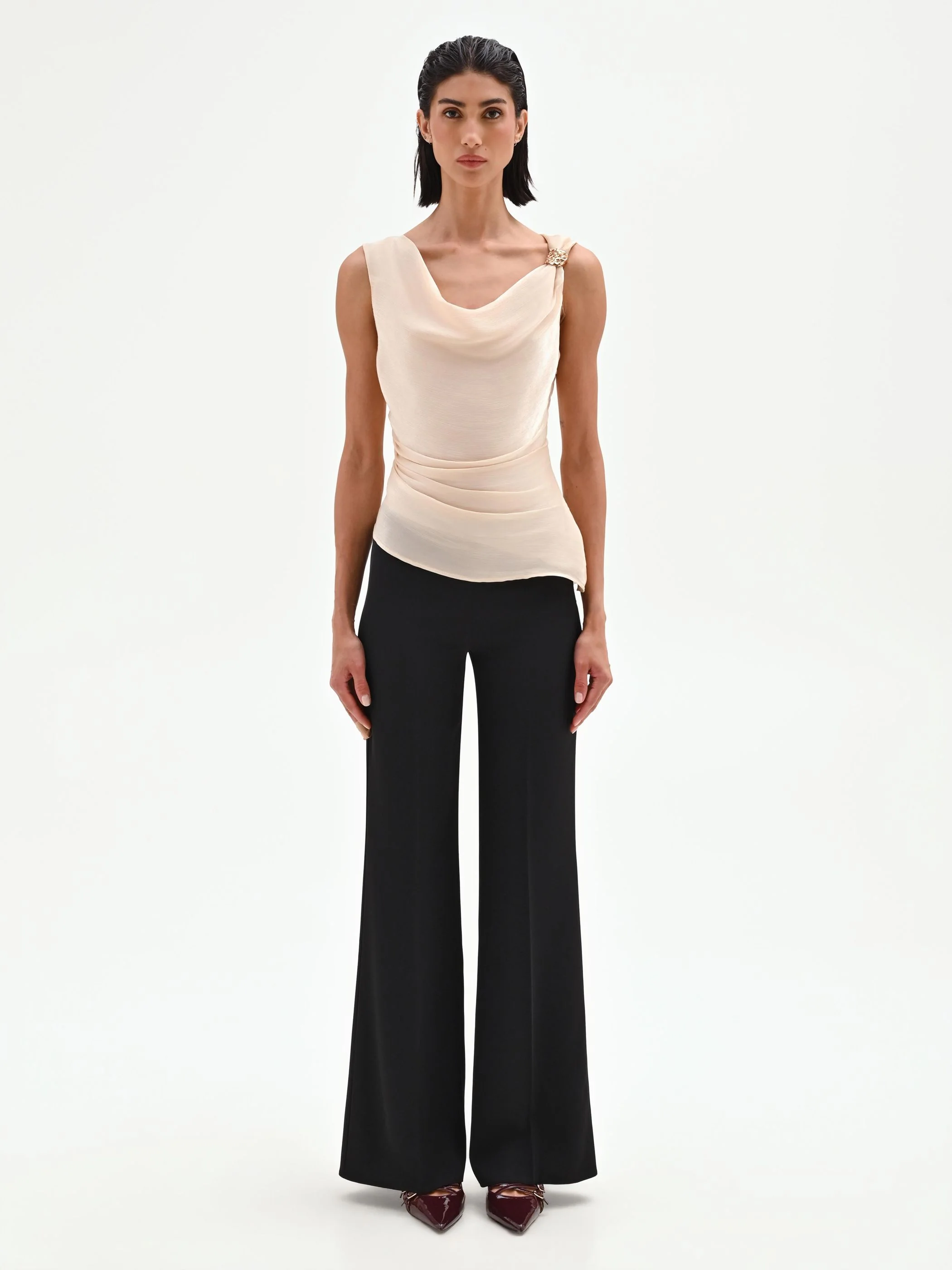 Top beige chiaro drappeggiato in tessuto cangiante