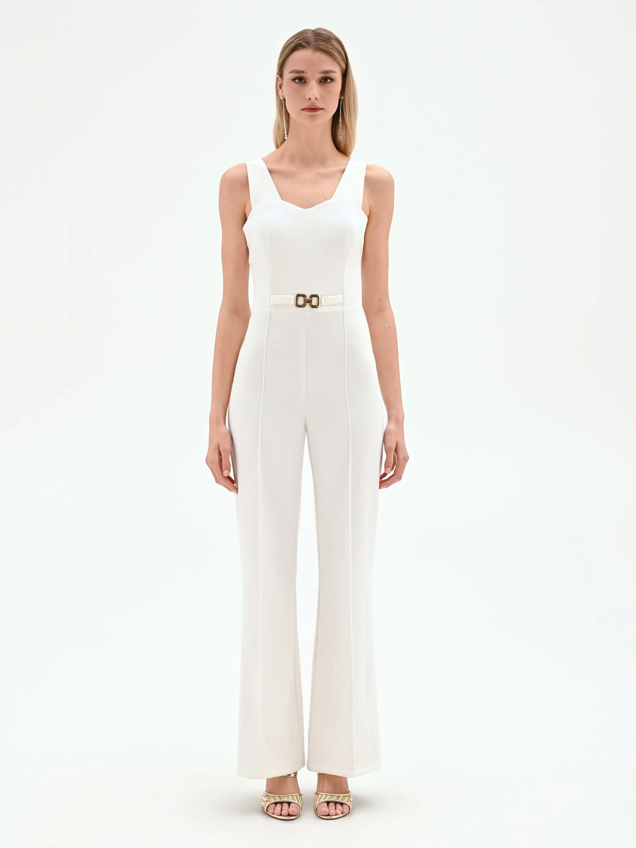 Tuta bianca con scollo a cuore e pantalone palazzo