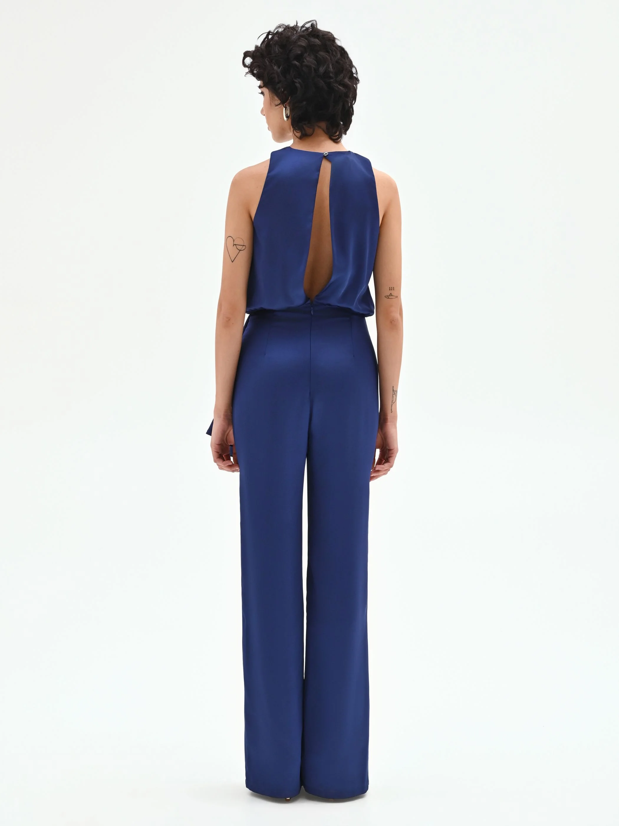 Tuta elegante blu brillante con drappeggio laterale - Image 3