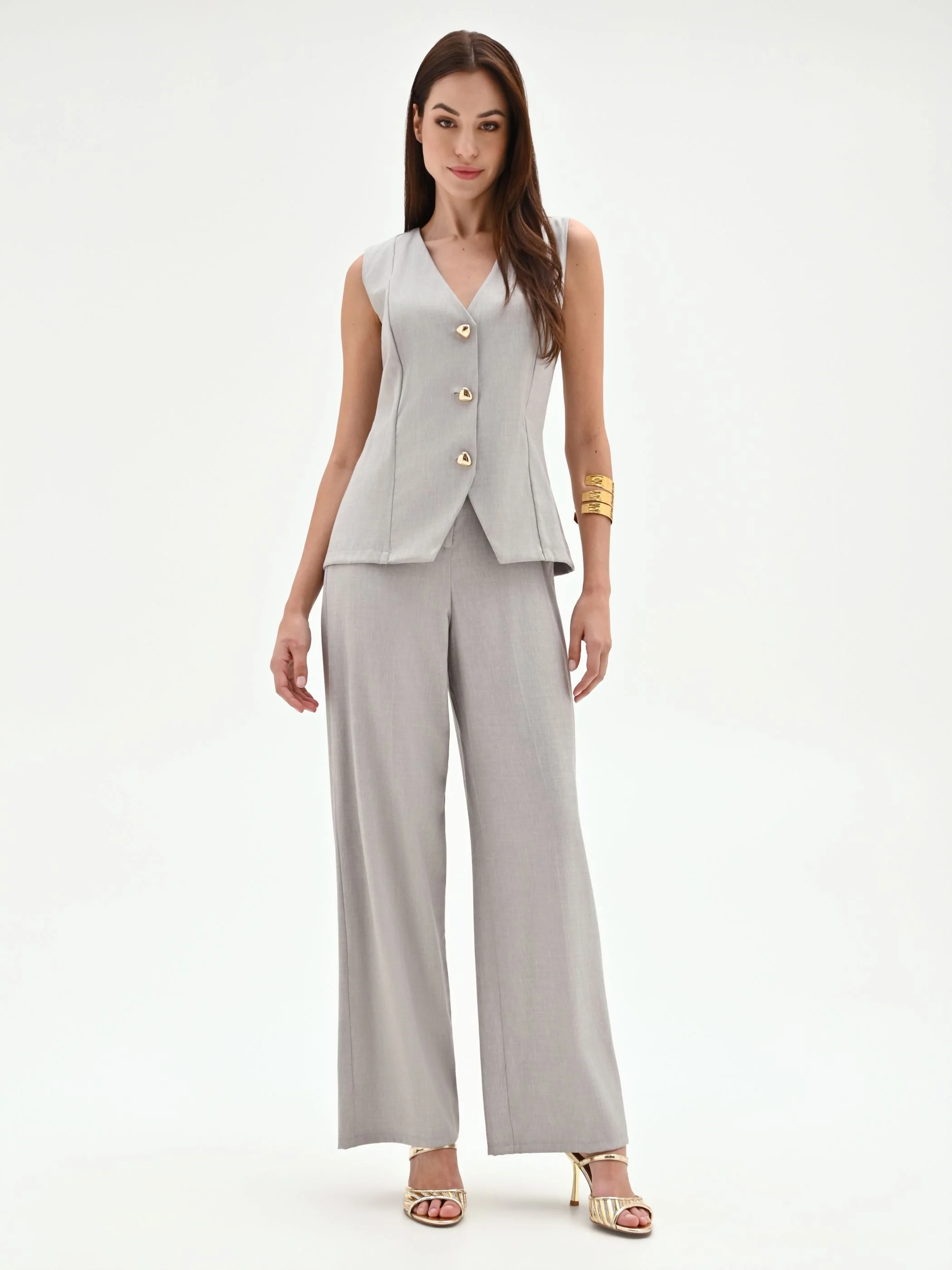Tuta grigia con gilet e pantaloni palazzo - Image 2