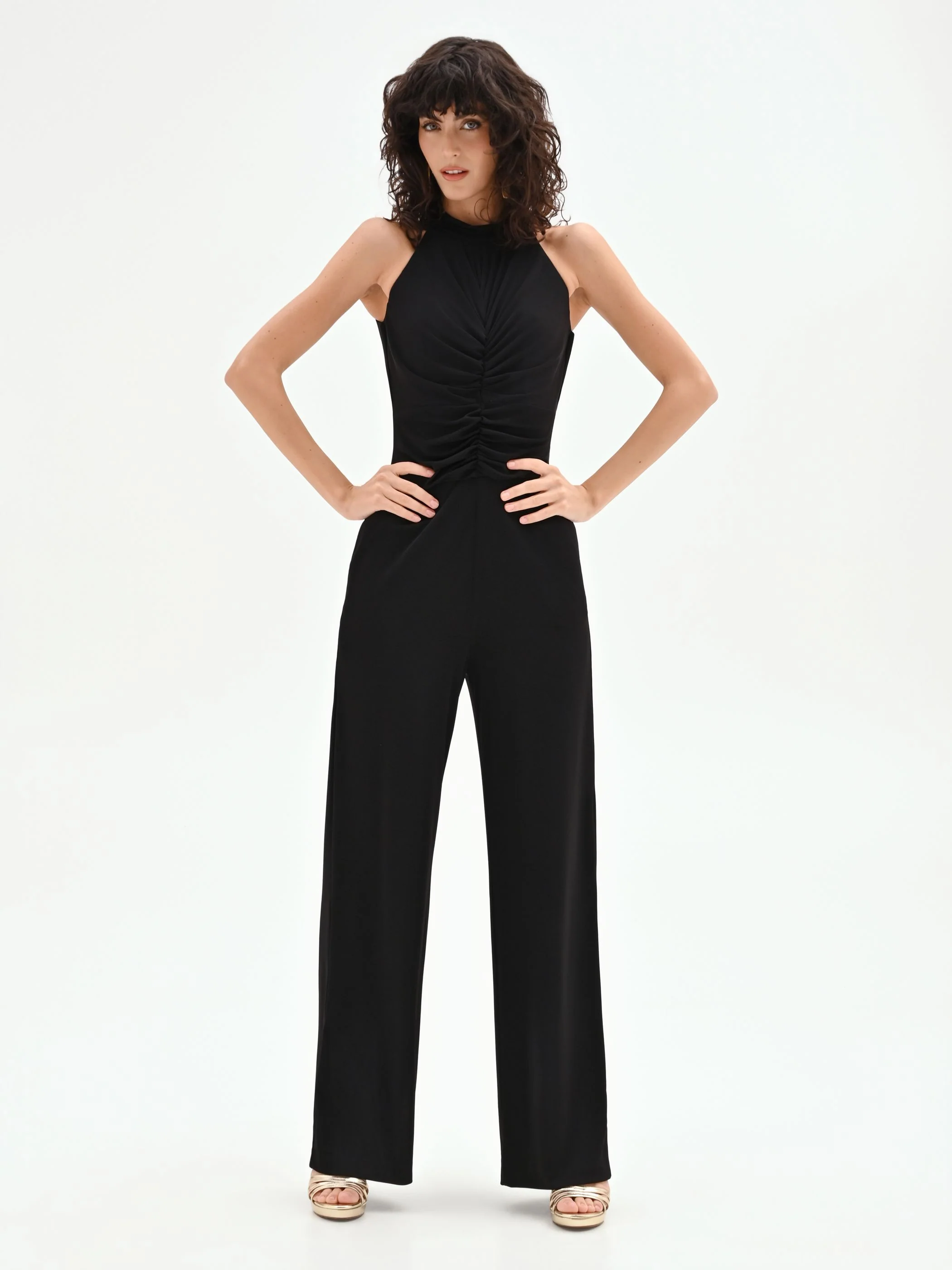 Tuta nera con drappeggio e pantalone a palazzo - Image 4